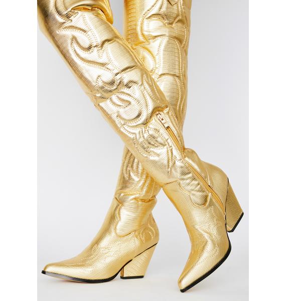 cowboy boots over knee