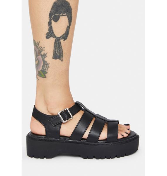 black buckle gladiator sandals