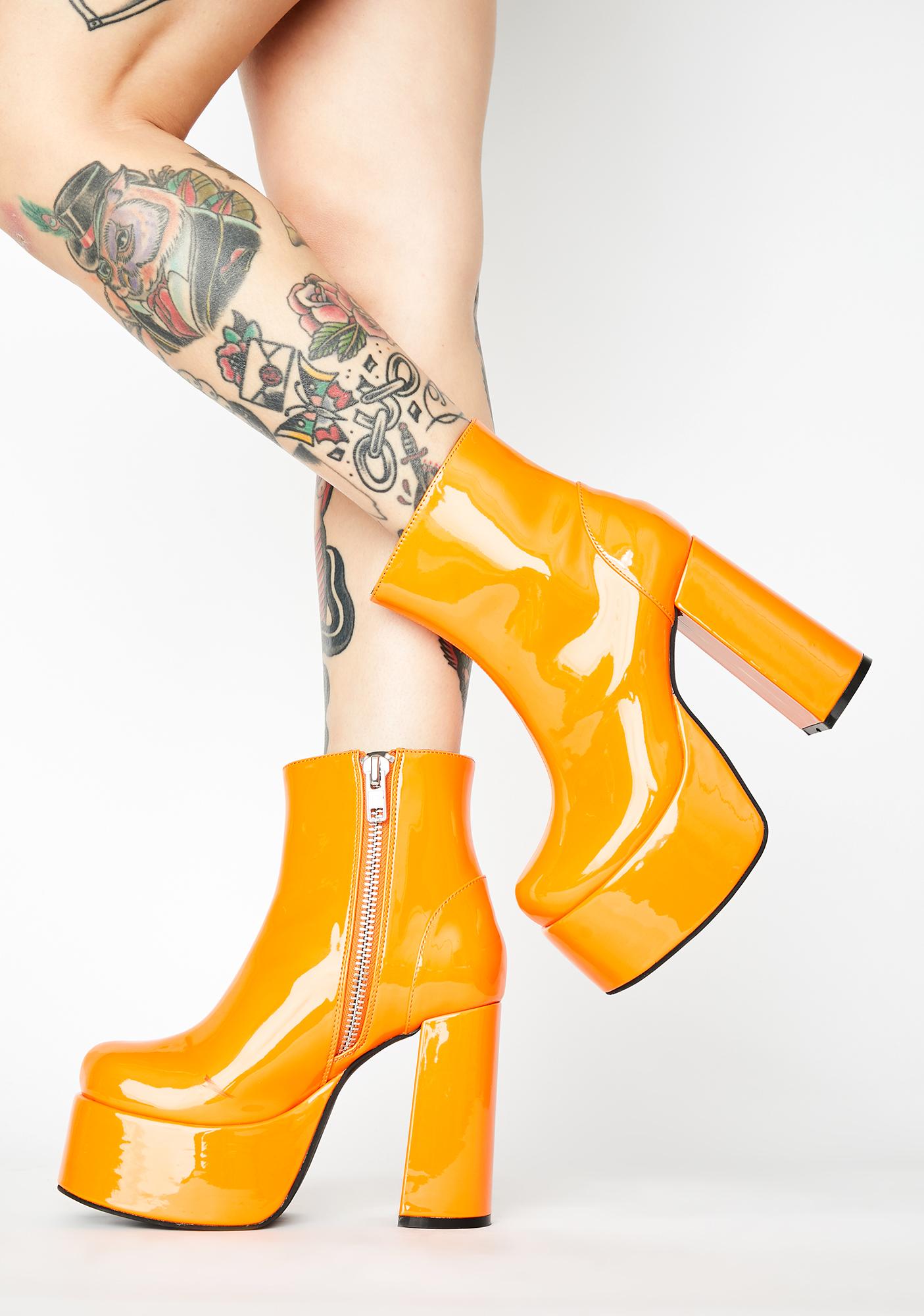 orange patent boots