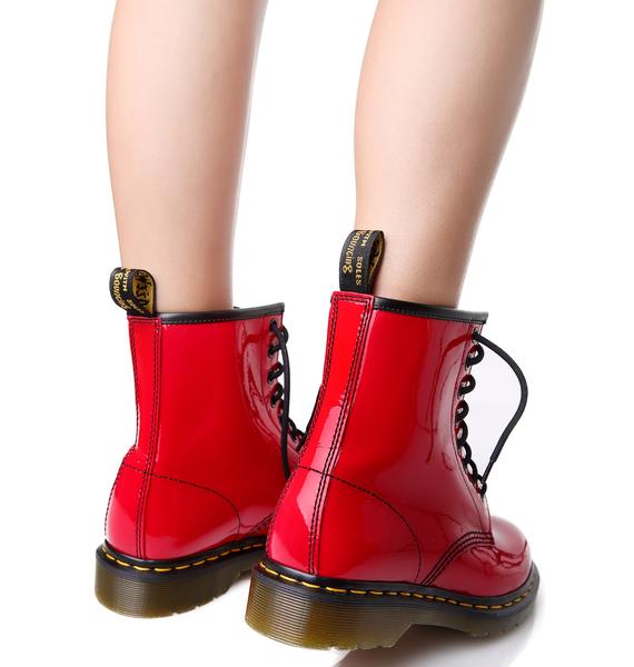 red shiny doc martens