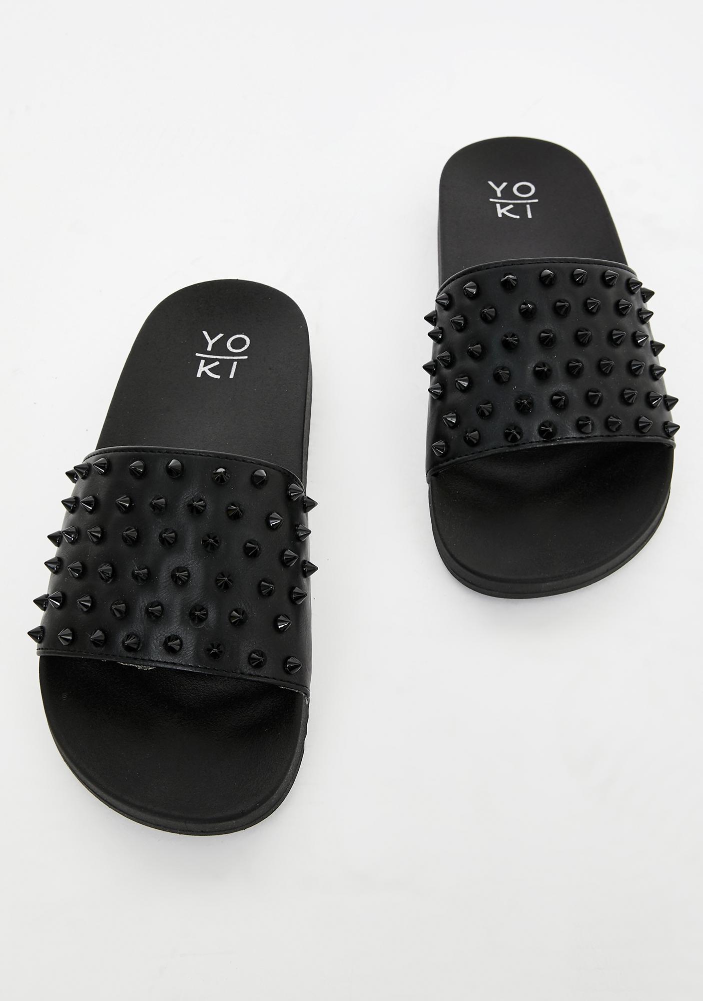 black spiked slides
