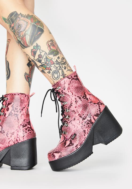 snakeskin wedge boots