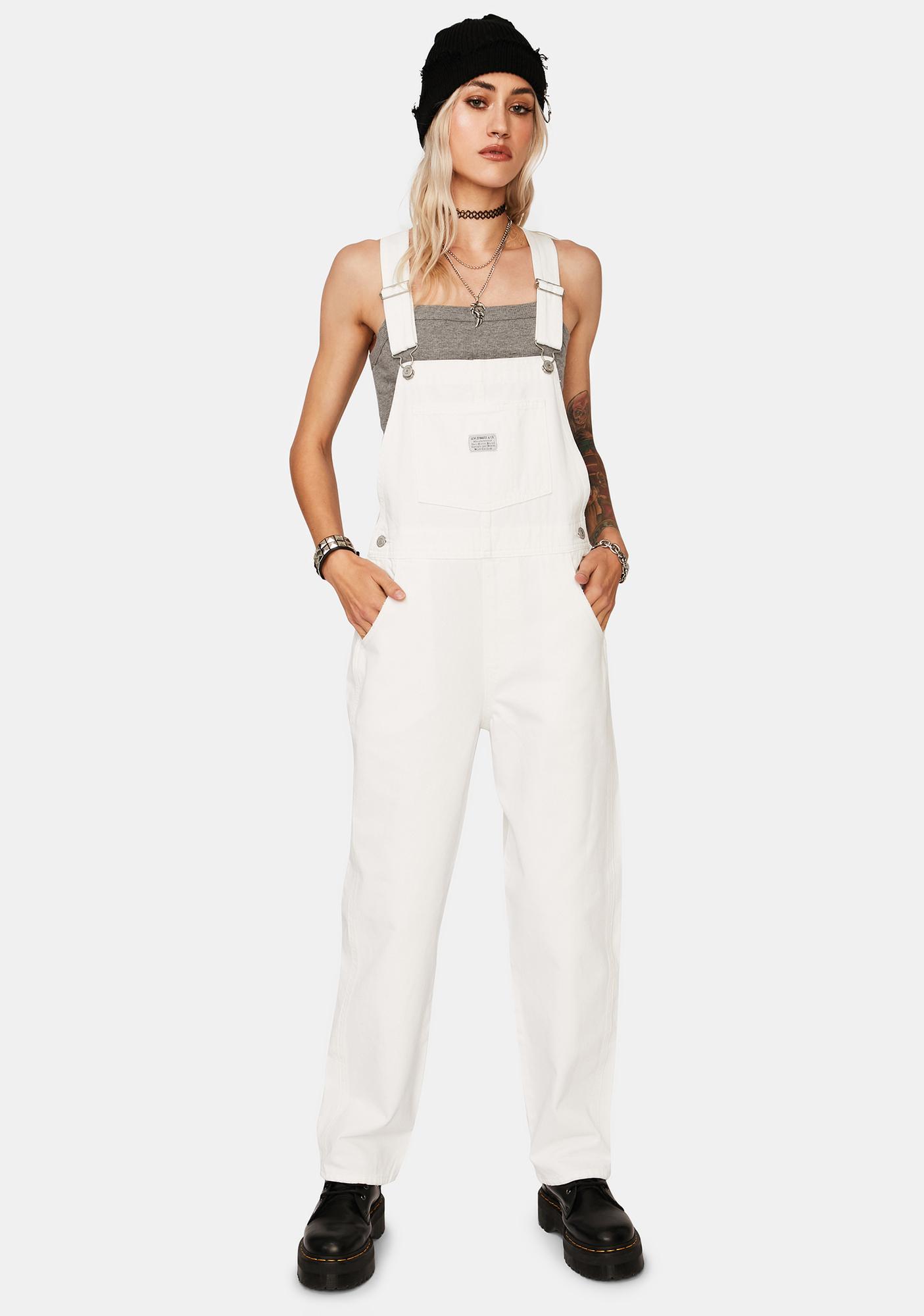 white baggy overalls