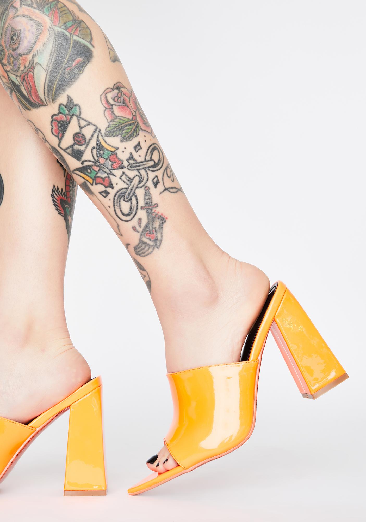 orange mules heels