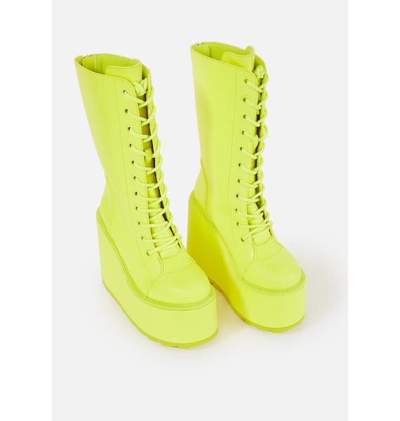 neon yellow knee high boots