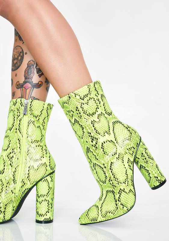 green snakeskin booties