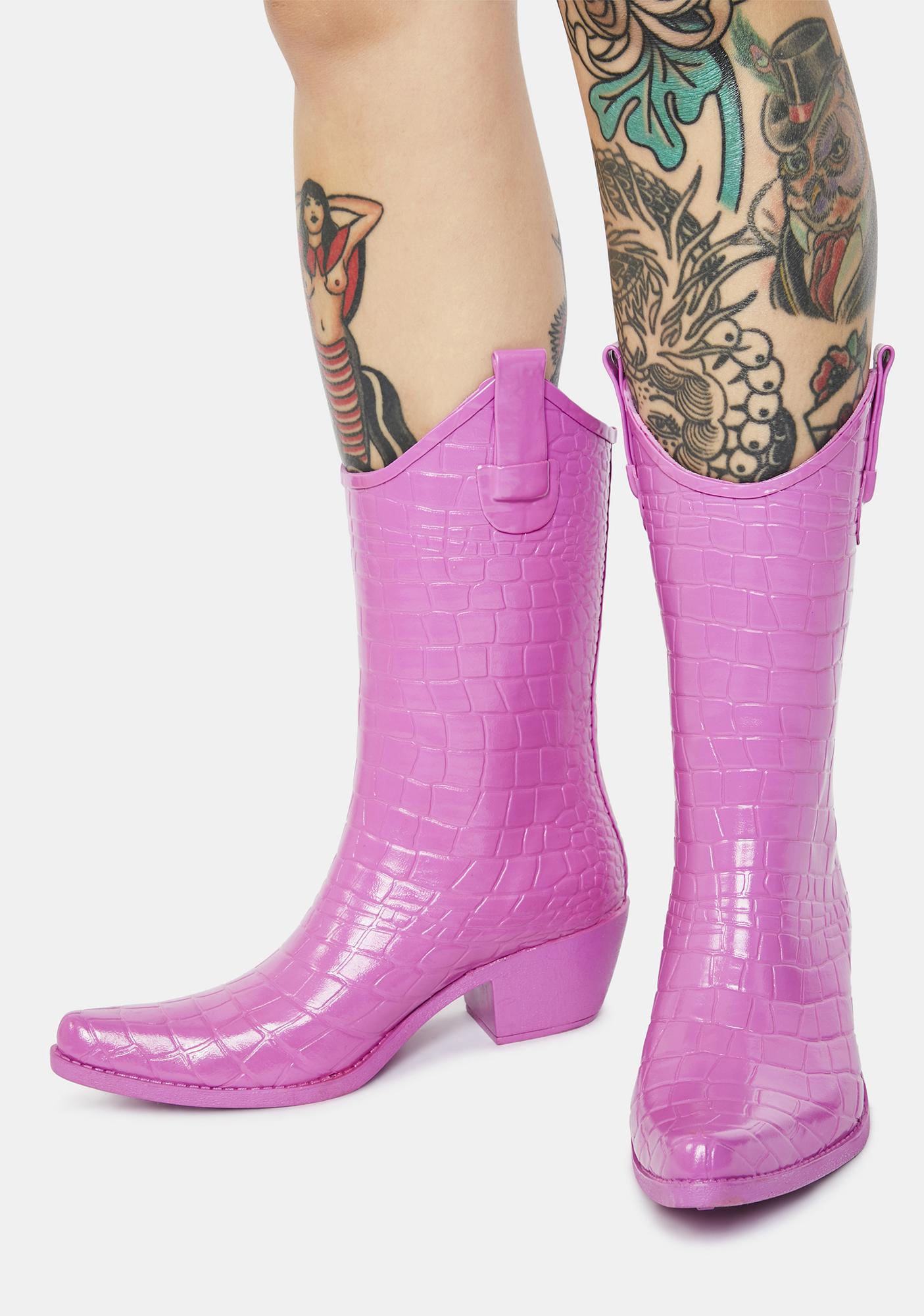 neon pink cowboy boots