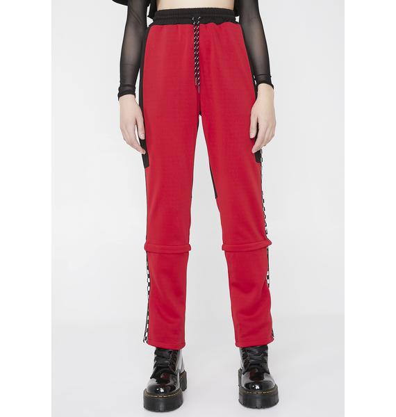 red pants with checkered stripe