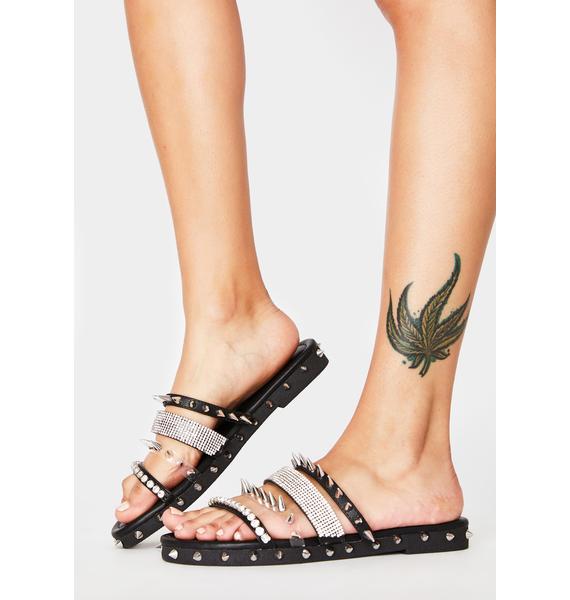 black spiked slides
